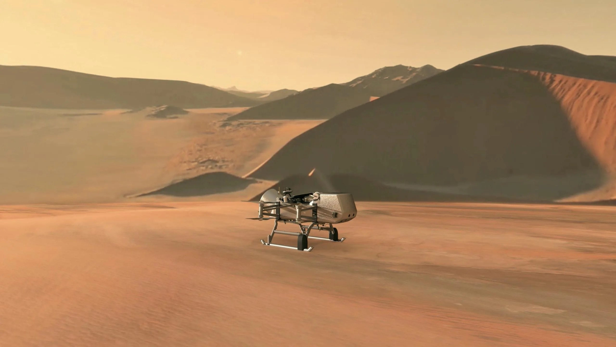 Esta ilustración muestra el helicóptero-módulo de aterrizaje Dragonfly de la NASA aproximándose a un sitio en la exótica luna de Saturno, Titán.