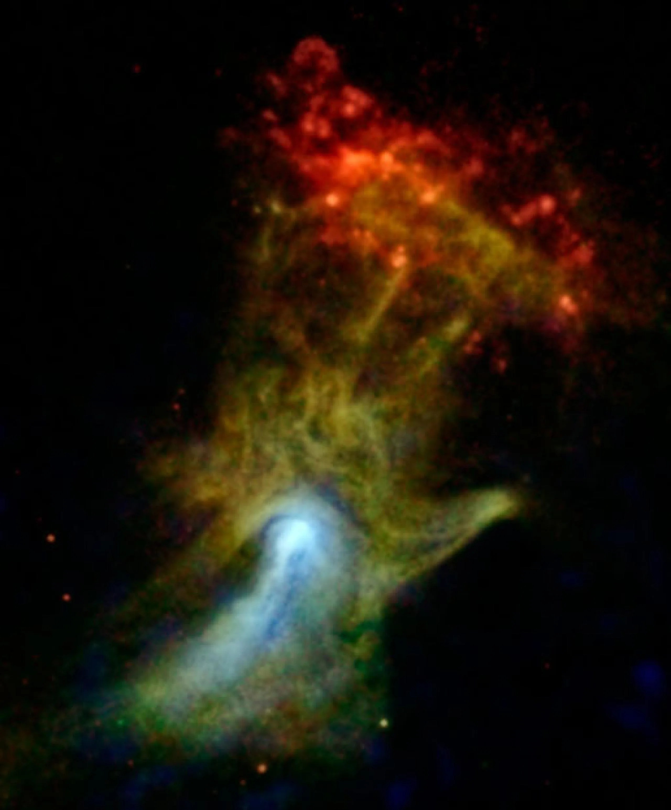 Se podría pensar que la mano parece una radiografía médica, pero en realidad es una nube de material expulsado de una estrella que explotó. Créditos: NASA/JPL-Caltech/McGill