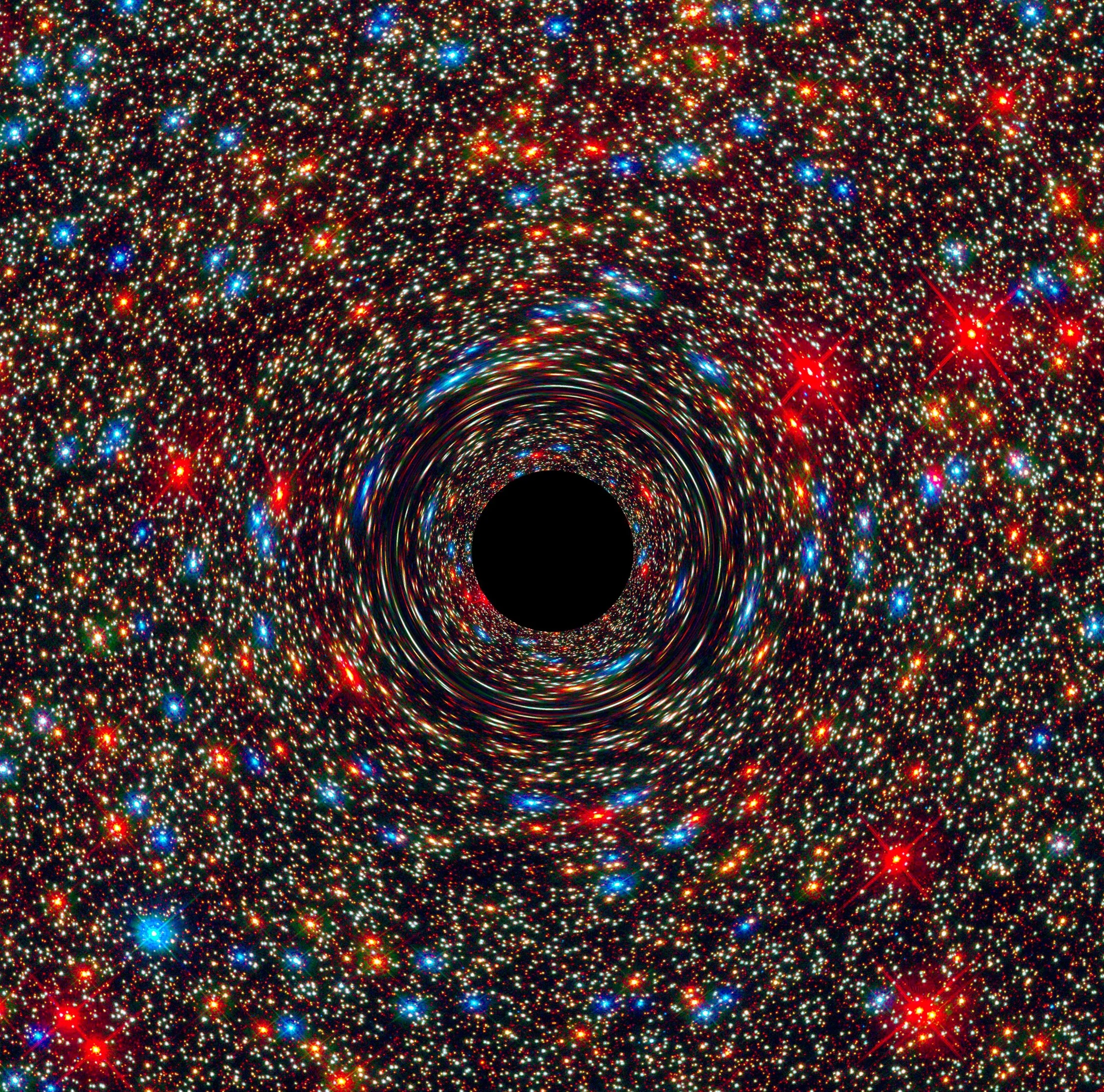 Ilustración de un agujero supermasivo rodeado de estrellas de varios colores.